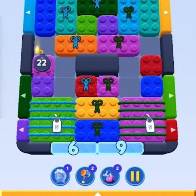 Schermata di gioco di Color Block Jam con blocchi colorati e lucchetti da far scorrere fuori dalla griglia