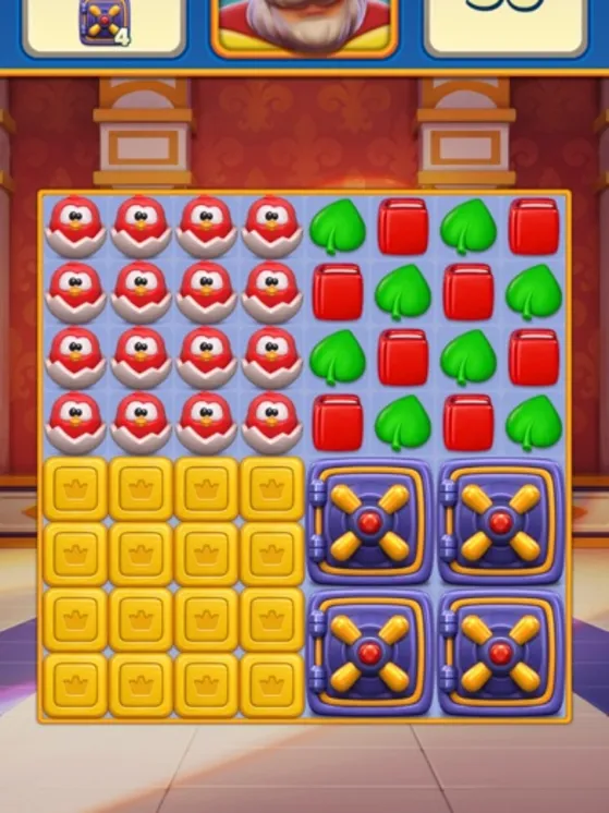 Schermata di gioco di Royal Match, tabellone di match-3 nel castello con obiettivo pesci rossi e casseforti da aprire